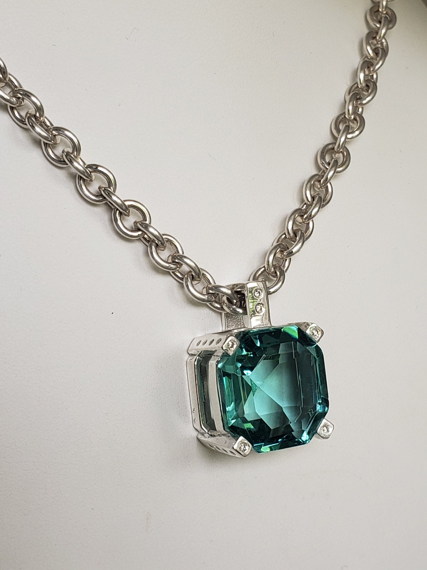 Emerald cut Green Beryl and diamonds